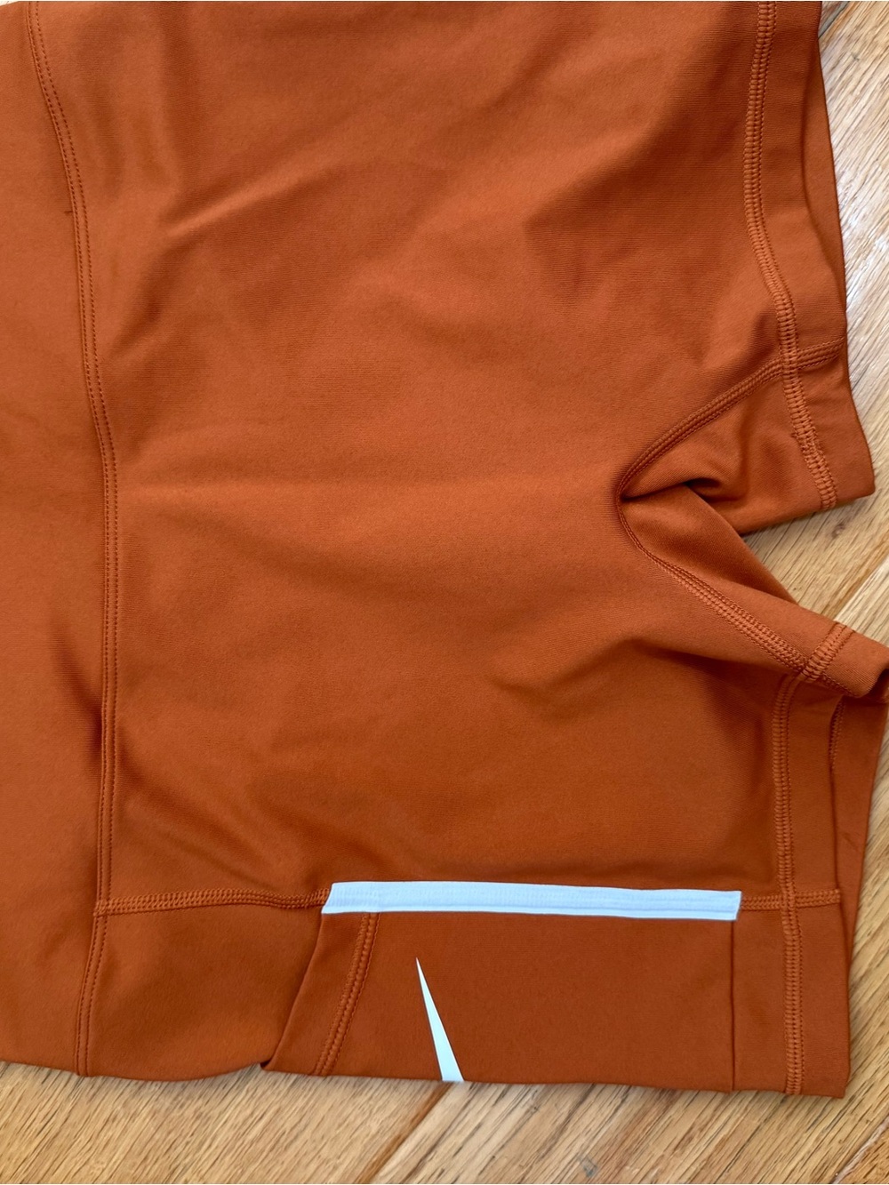 Nike Dri-FIT Rust Orange Top with Black Swoosh